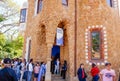 Tourists queuing in front of the PorterÃ¢â¬â¢s Lodge Pavilion in Park Guell.